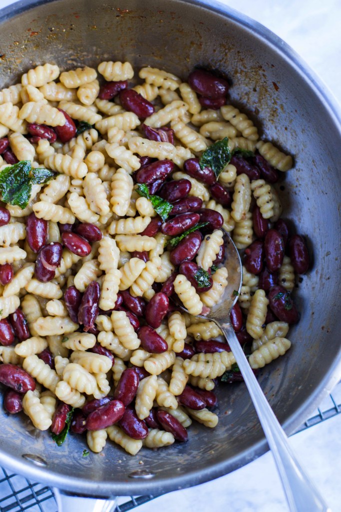 Vegetarian pasta sauce with cheese, beans, and mint