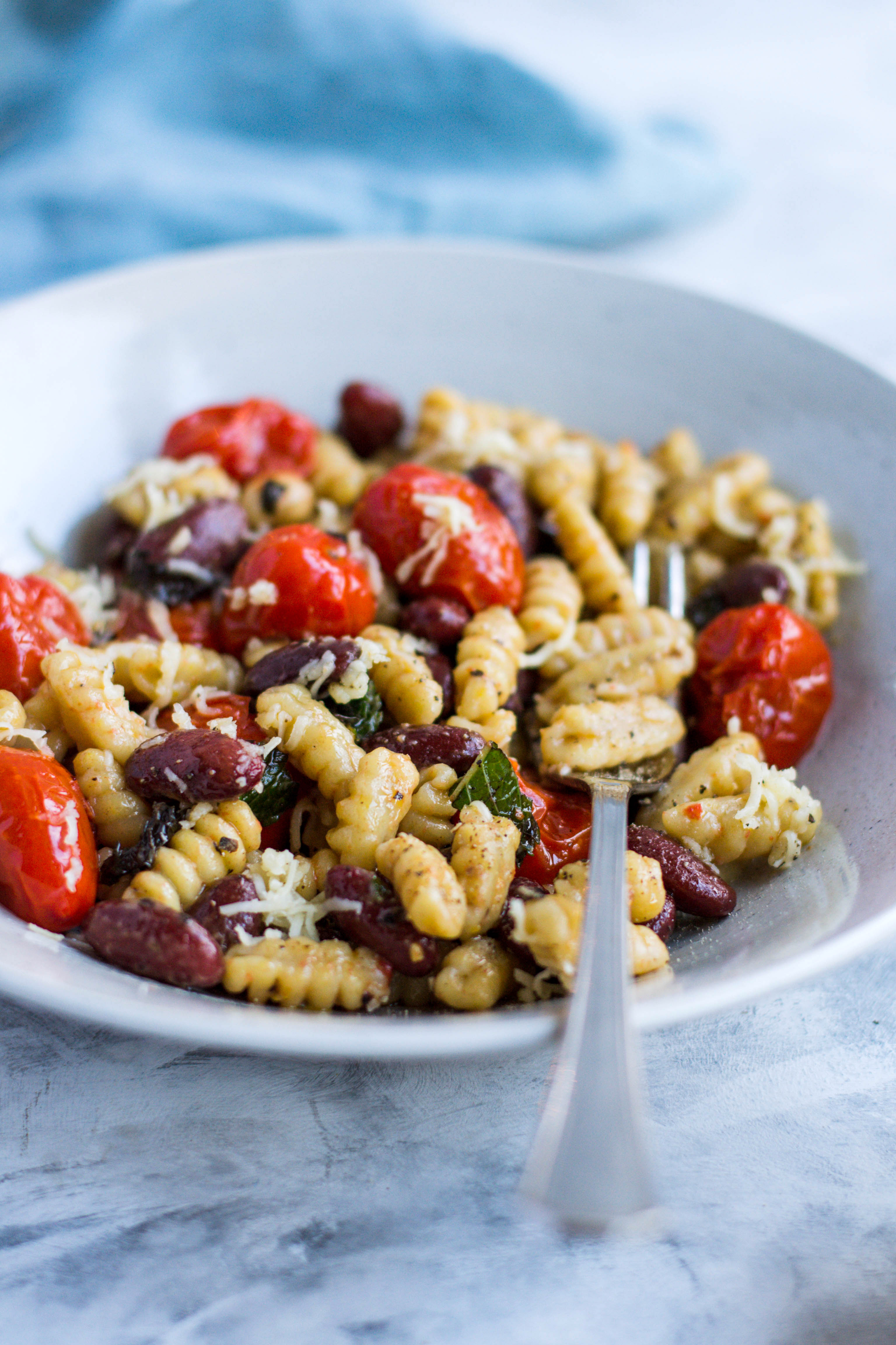 Pasta with beans, tomatoes, and cheese