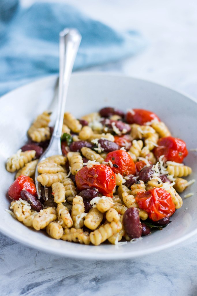 Pasta with beans, tomatoes, and cheese