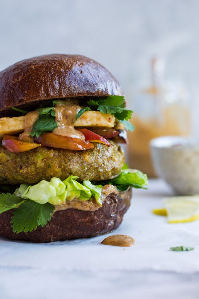 Chickpea veggie burgers with fried halloumi and peaches