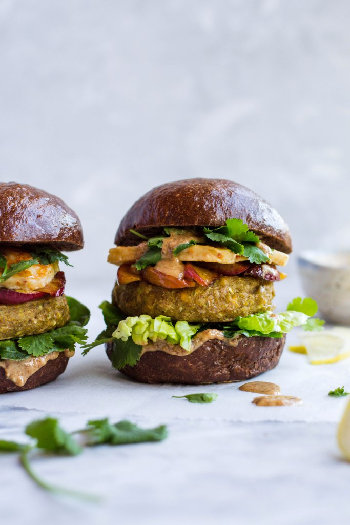 Chickpea veggie burgers with fried halloumi and peaches