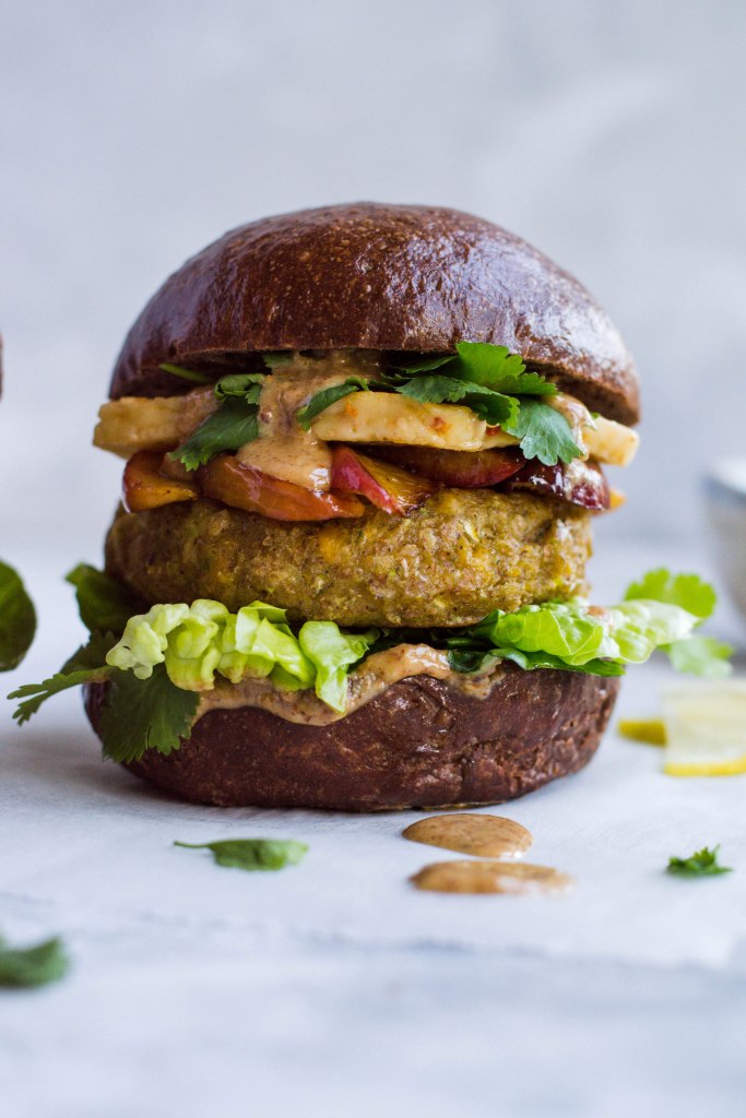 Chickpea veggie burgers with fried halloumi and peaches