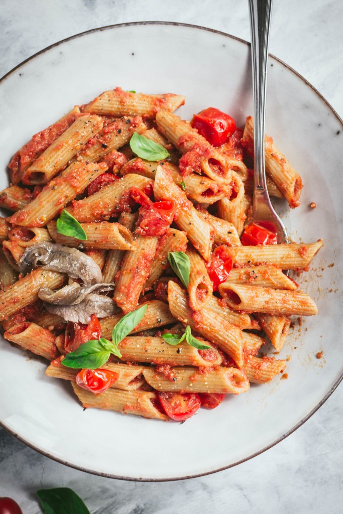 A delicious pasta sauce with tomato passata, fresh baby plum tomatoes, and anchovies. Ready in less than 10 minutes! Recipe on amatterofnourishment.com