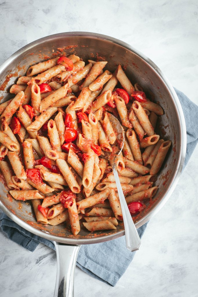 A delicious pasta sauce with tomato passata, fresh baby plum tomatoes, and anchovies. Ready in less than 10 minutes! Recipe on amatterofnourishment.com
