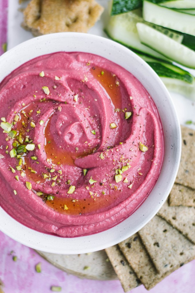 Smooth beetroot hummus with pistachios