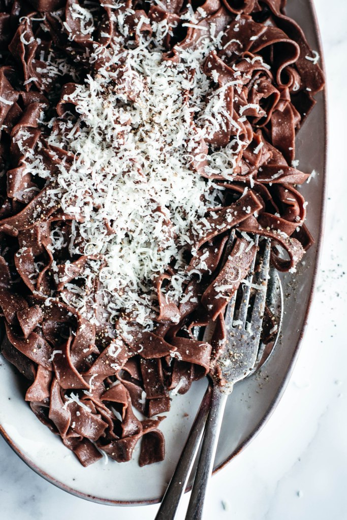 Fresh pasta is a labour of love and great pasta needs practice: these homemade cocoa tagliatelle are a wonderful way to step-up your pasta game pairing a very basic shape with cocoa powder and its characteristic flavours and colour. Delicious when served with melted cheese and spices, this fresh pasta with cocoa will definitely surprise you with its special taste.