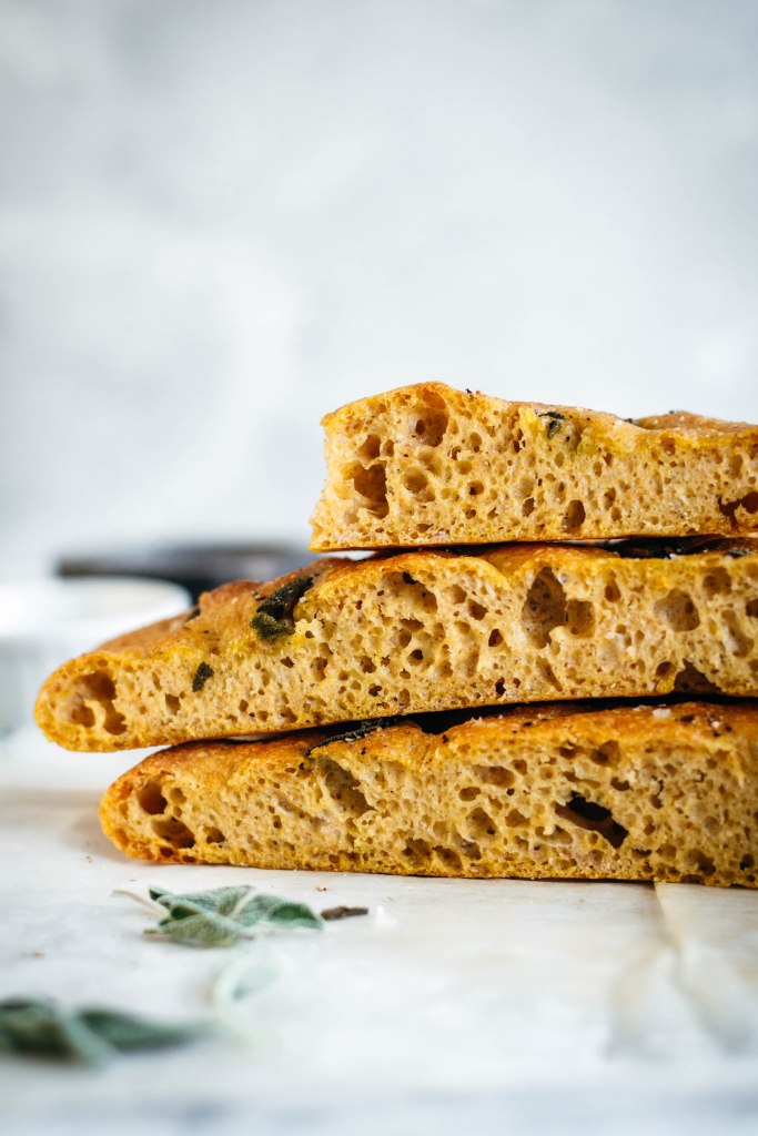 Delicious even when eaten on its own, this soft vegan pumpkin focaccia has a sweet finish and a pillowy texture, that may help this one to easily become one of your favourite recipes!